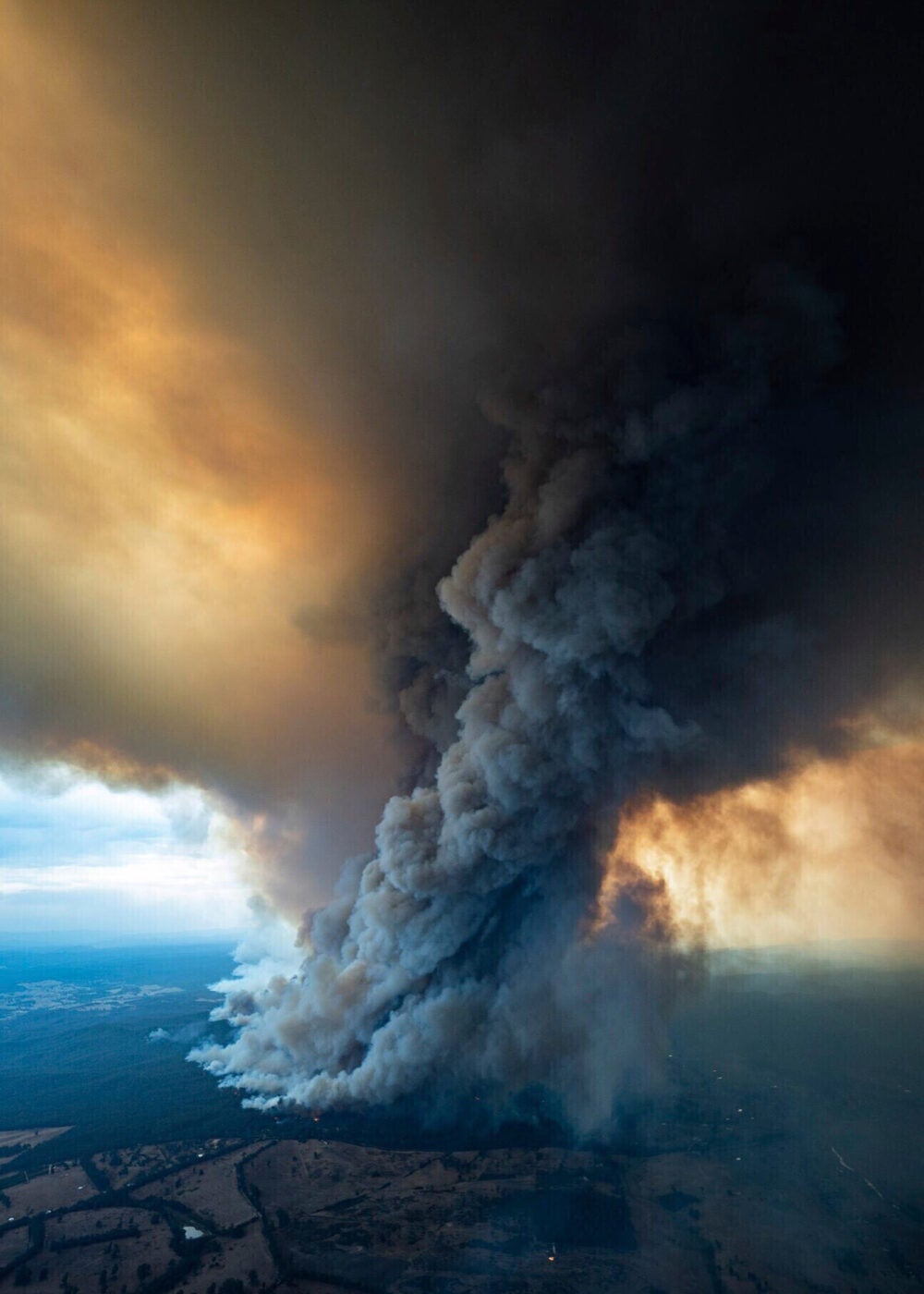 Aerial shot of massive plume of smoke rising from Australia wildfires.