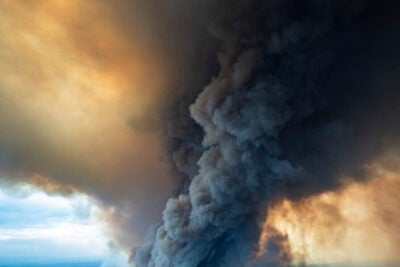 Aerial shot of massive plume of smoke rising from Australia wildfires.