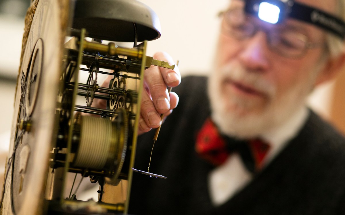 Richard Ketchen working on a clock.