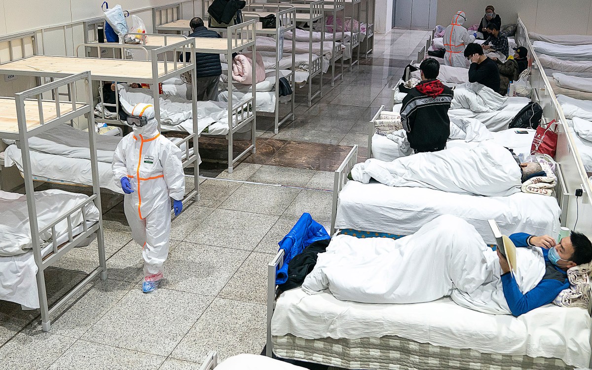 Patients in a makeshift hospital in China.