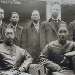 A photo of several Chinese men.