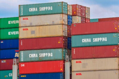 Shipping containers with China stamped on them.