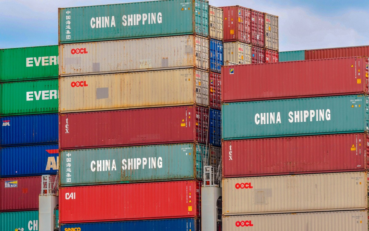 Shipping containers with China stamped on them.