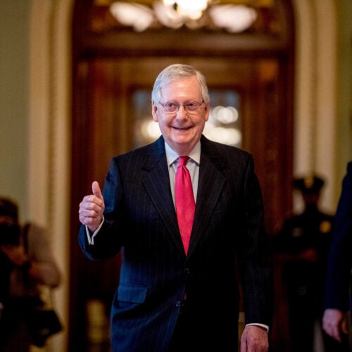 Senate Majority Leader Mitch McConnell gives a thumbs up