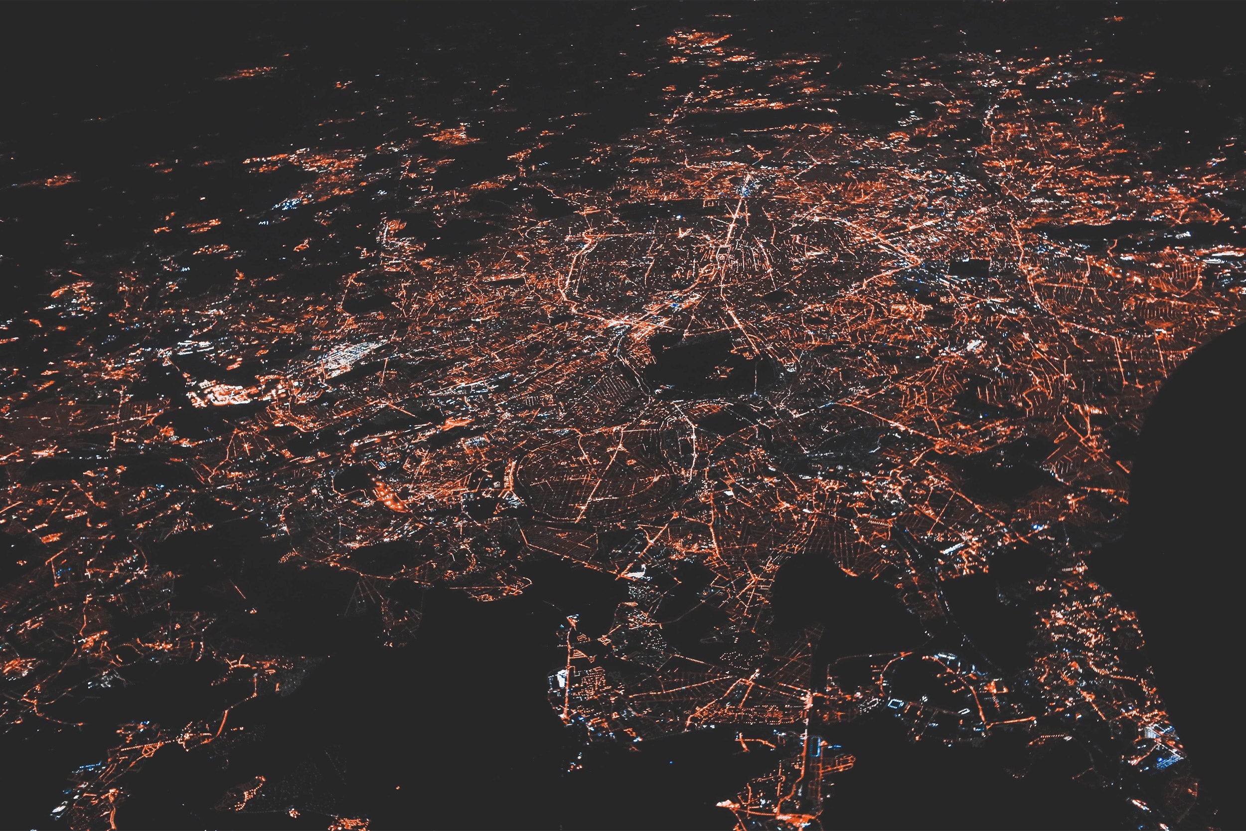 View from above of city network of lights.