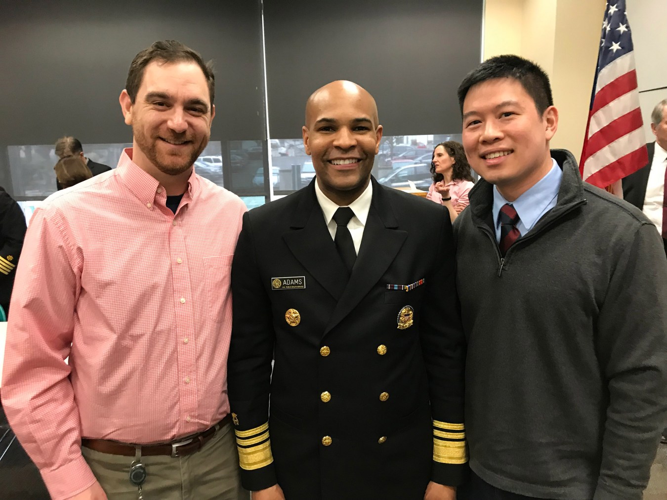 Officer Steven Rekant, US surgeon General Jerome M. Adams adn Alex Wu.