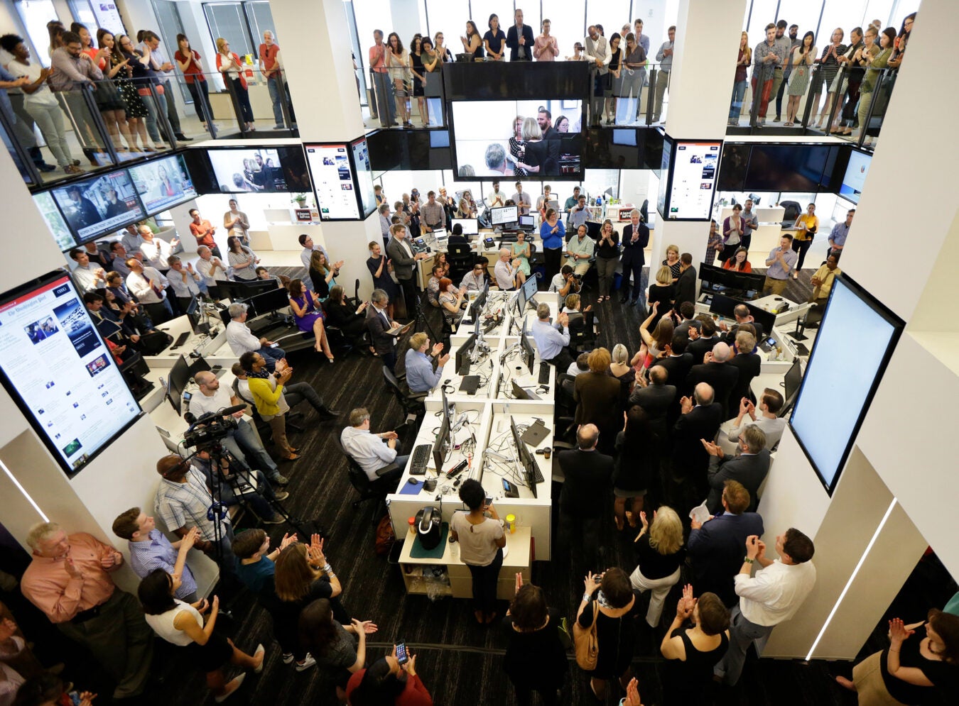 Washington Post newsroom after getting 2016 Pulitzer Prize for National Reporting.