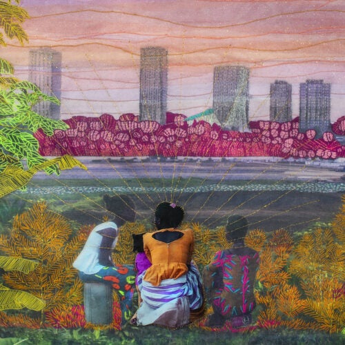 Embroidered photo of three people looking at cityscape and sunset across body of water.