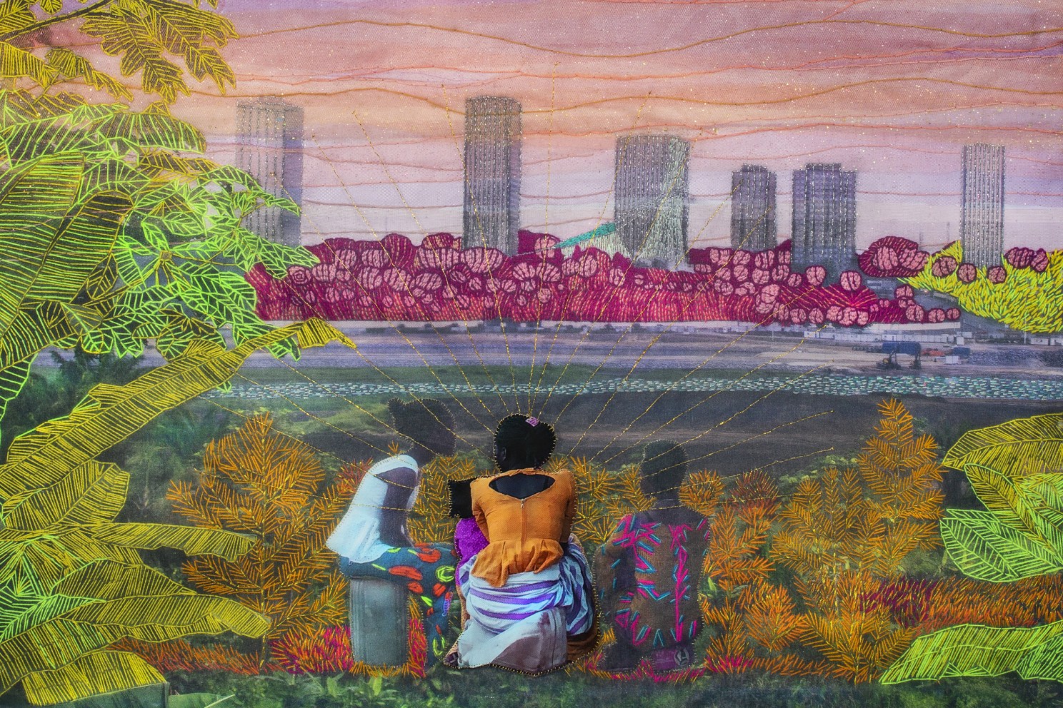Embroidered photo of three people looking at cityscape and sunset across body of water.