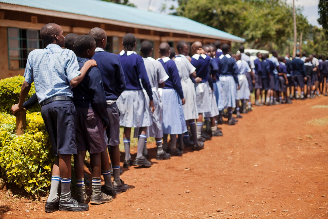 Schoolchildren standing in line.