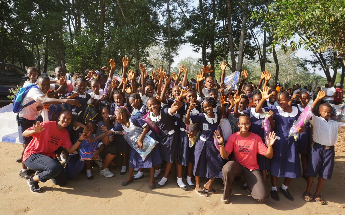 Suuba and Sadia Demby with children in Sierra Leone.