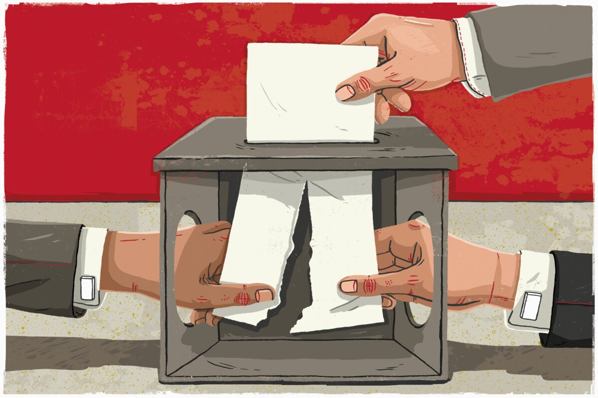 People with hands in ballot box.