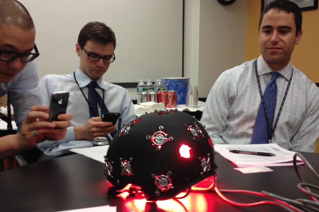 Researchers with helmet.