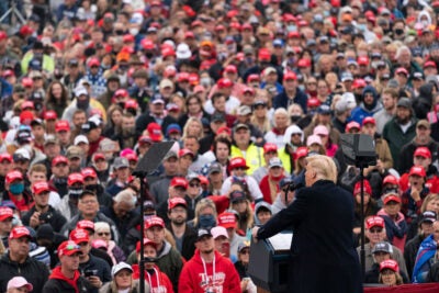 President Trump talking to a mask-free crowd.