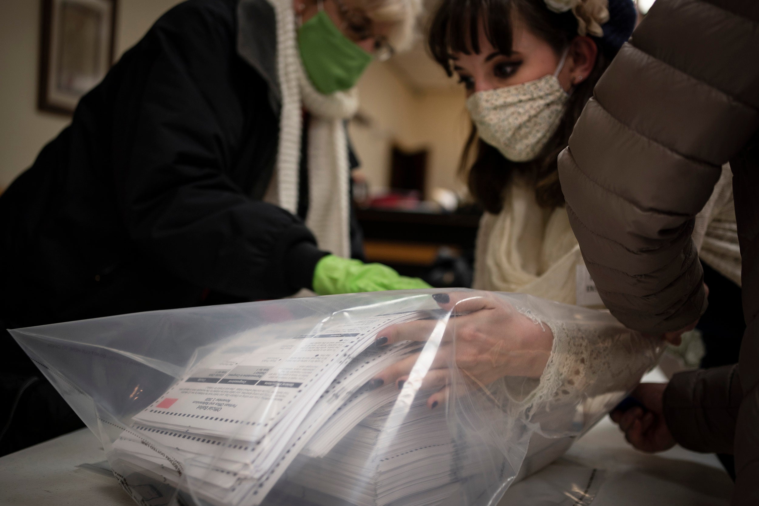 Election staff packing ballots.