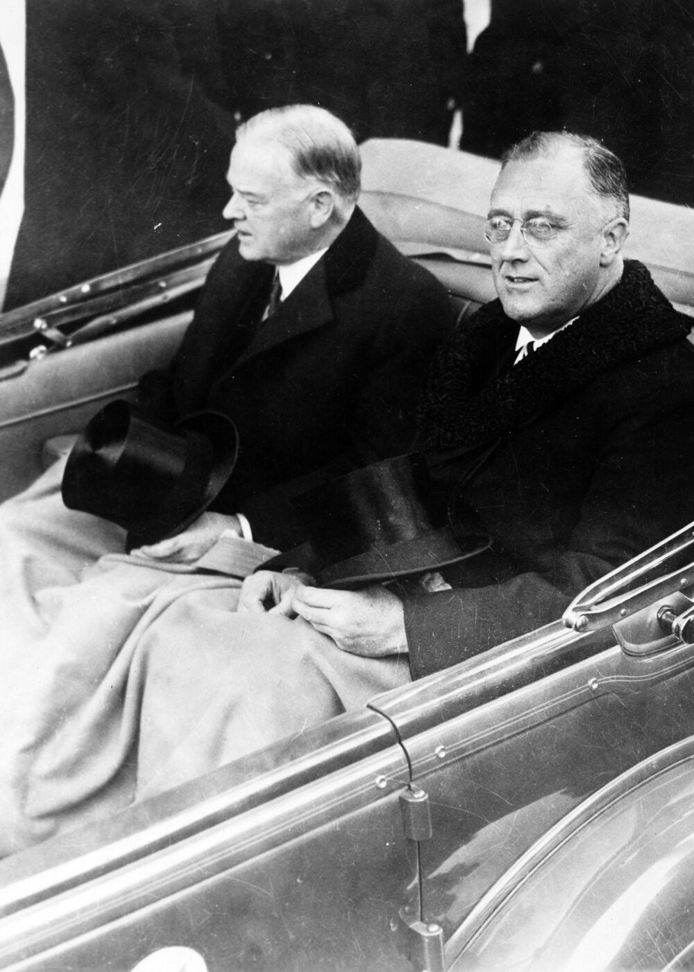 Franklin Delano Roosevelt and Herbert Hoover in convertible automobile on way to U.S. Capitol for Roosevelt's inauguration, March 4, 1933