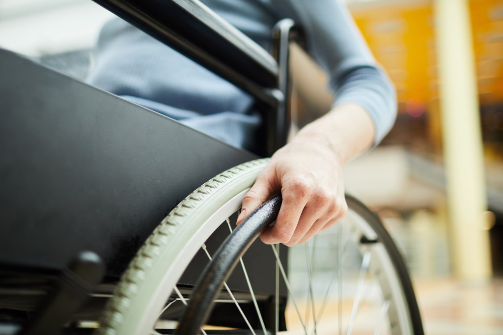 Women in wheelchair.