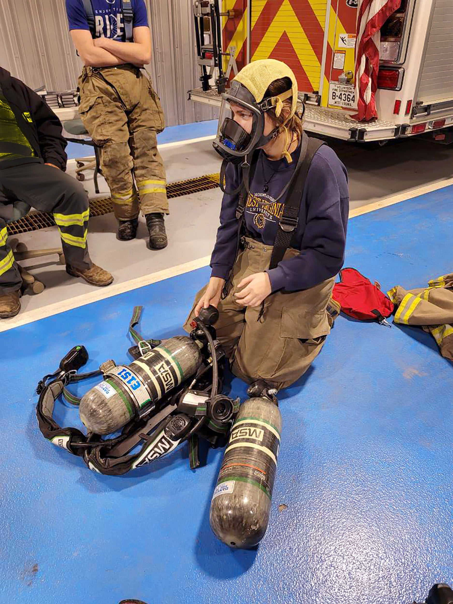 Demonstrating equipment at the fire department.