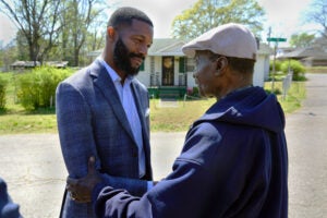 Mayor Woodfin and a citizen.