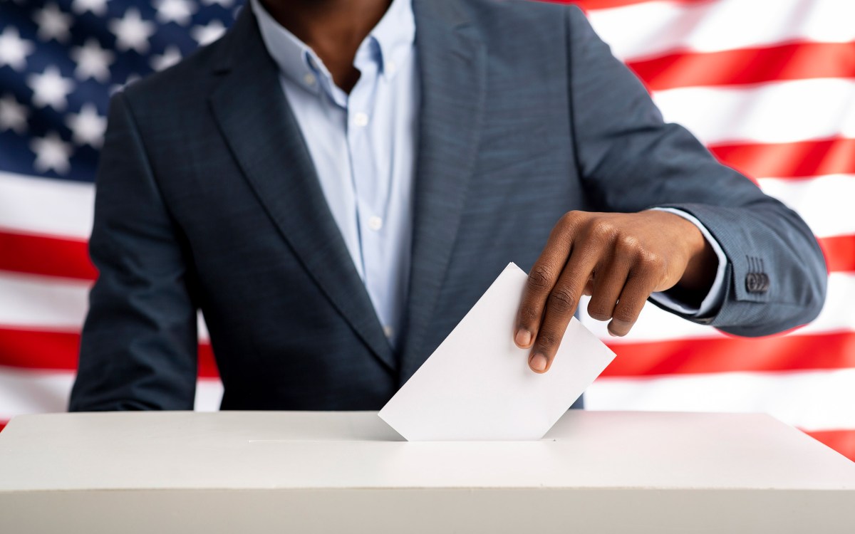 Black man voting.