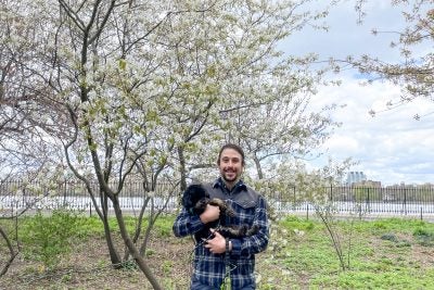 Nelson LaMarche, Ph.D. ’20, with his miniature poodle, Wyatt. When LaMarch arrived at Harvard Medical School his research focused on immunometabolism and obesity. 
