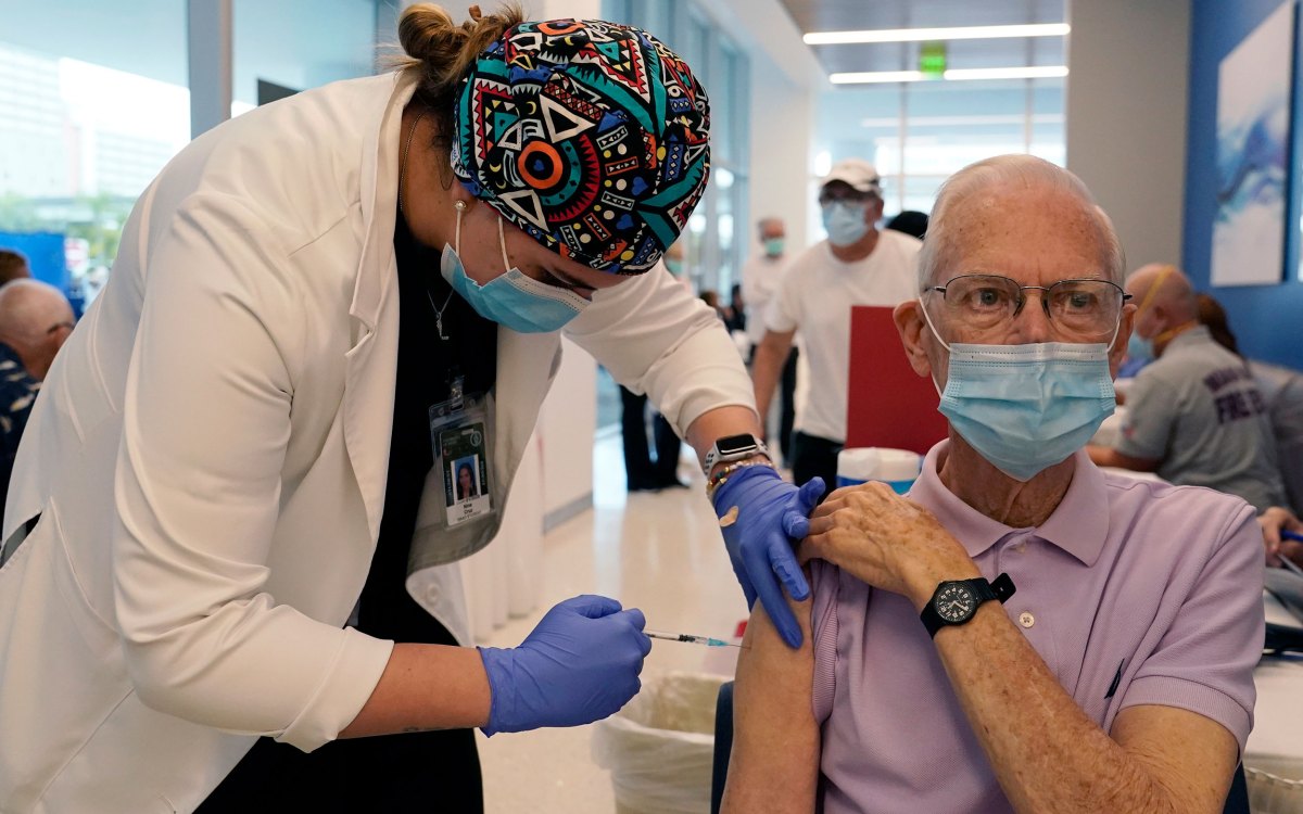 Senior citizen getting a vaccine.