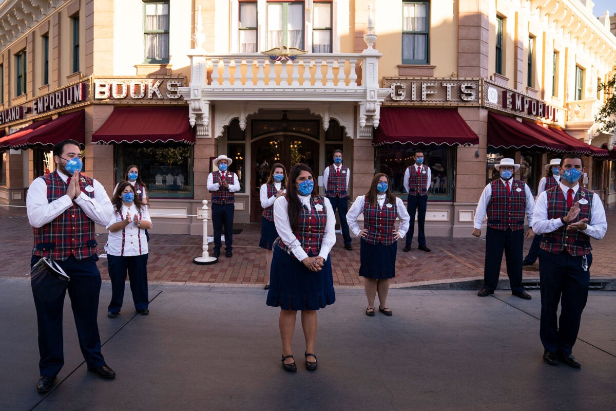 During a meeting at Disneyland in Anaheim, California, employees wear masks and stand socially distanced. The Disney Co. has a comprehensive approach to COVID and its employees' well-being.