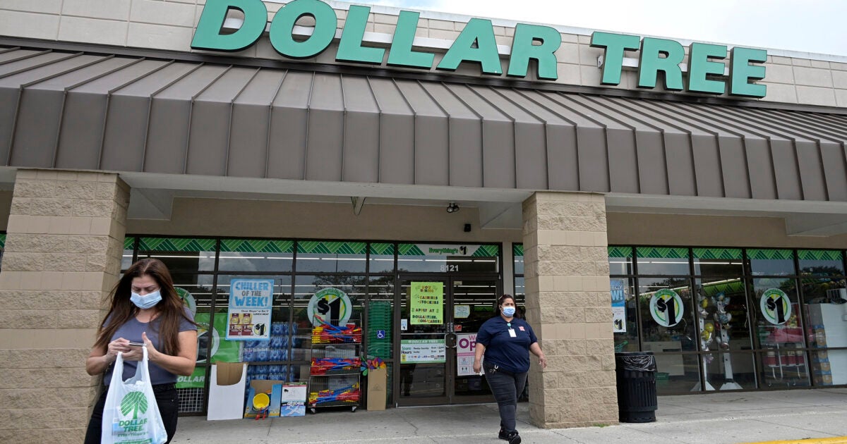Customers leave a Dollar Tree.