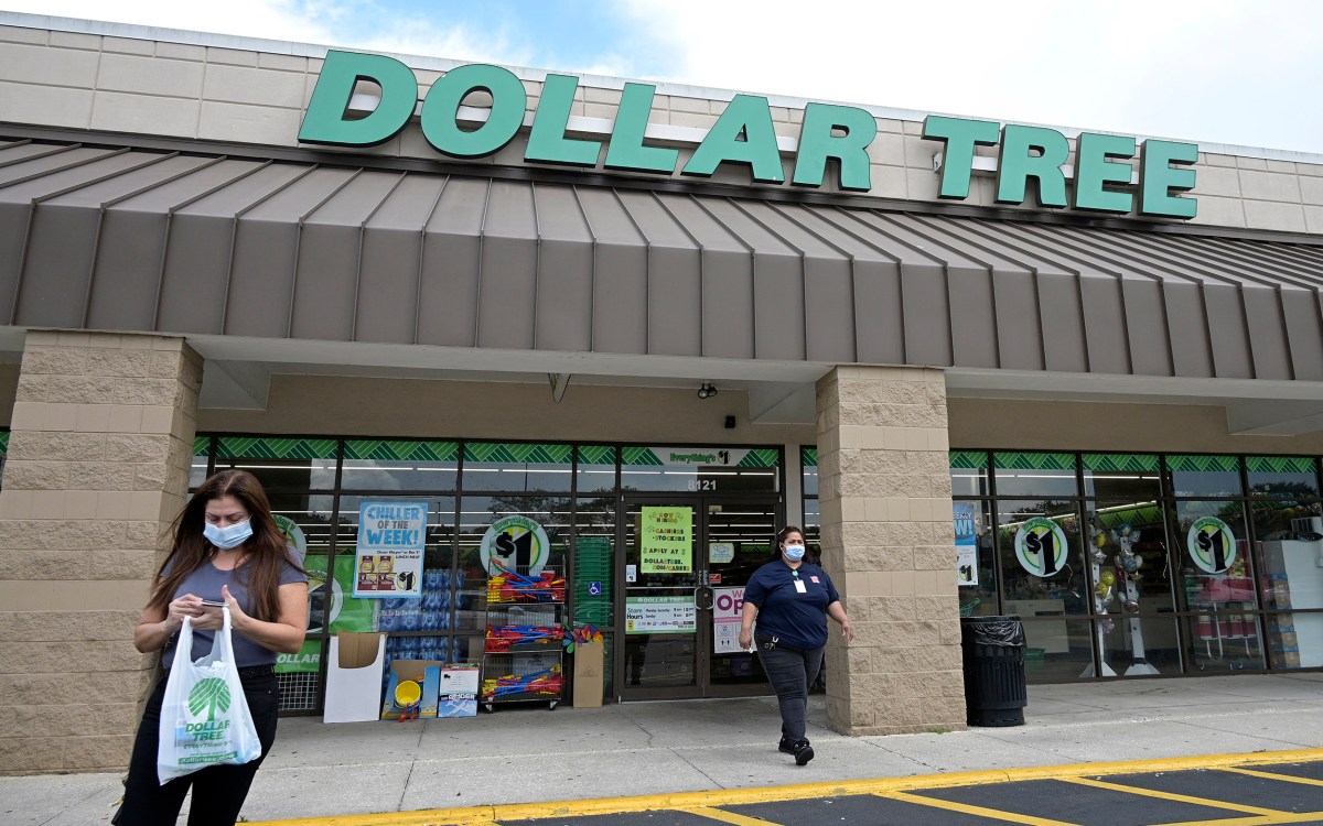 Customers leave a Dollar Tree.