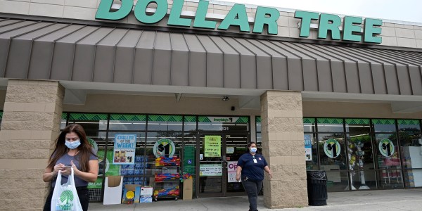 Customers leave a Dollar Tree.
