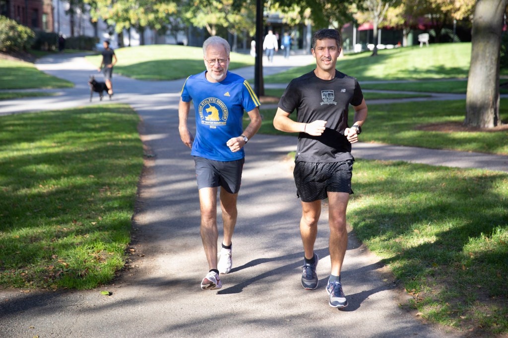 Daniel Lieberman, (blue shirt) and Aaron Baggish.