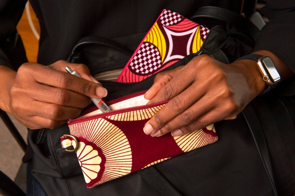 Oyinda Oyelaran displays her Nigerian fabric purchases/