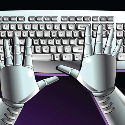 Roboto rankos ant klaviatūros.