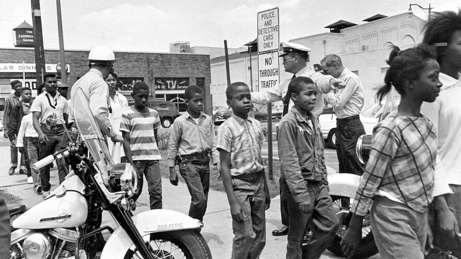 A 1963 photo of police leading a group of Black children to jail.