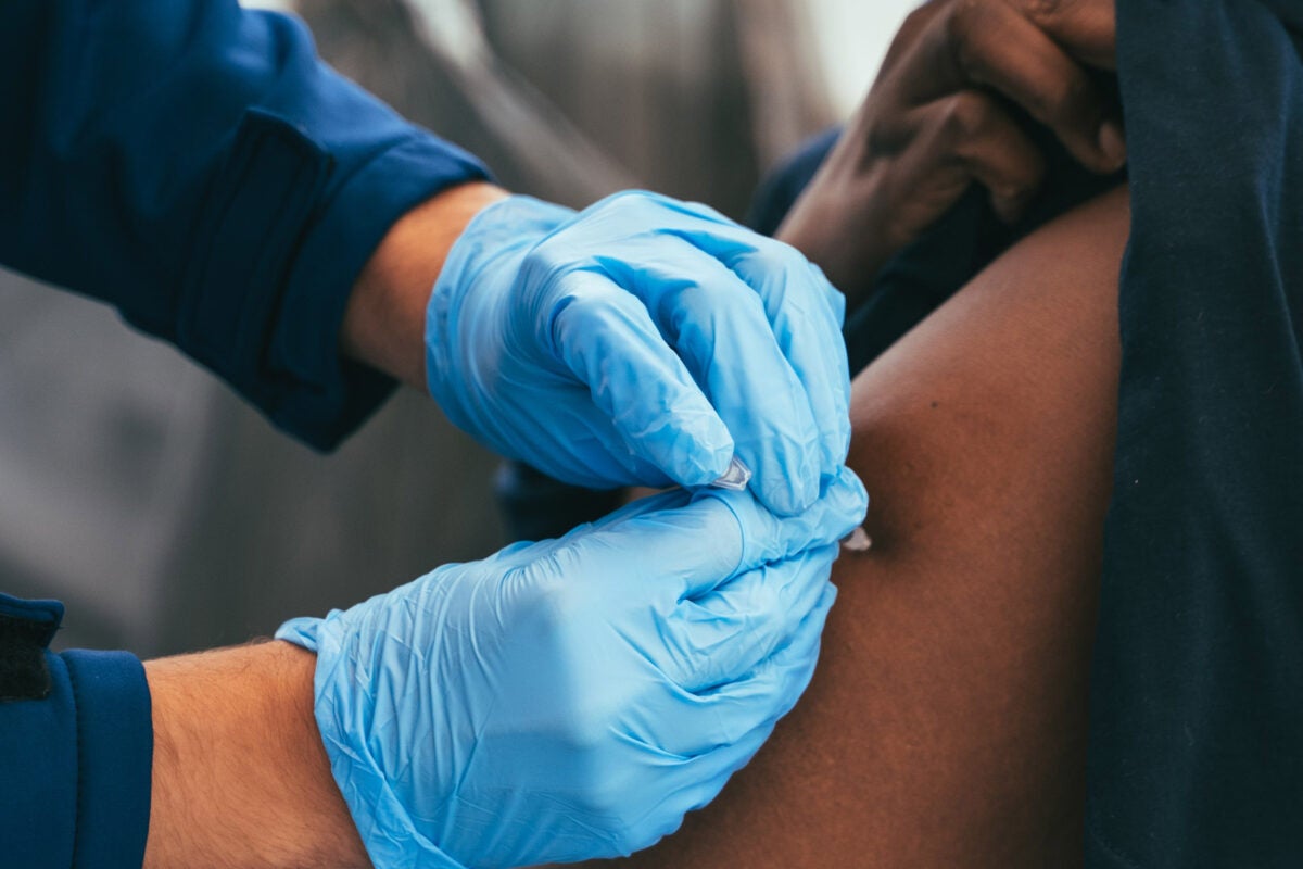Person receives vaccine.