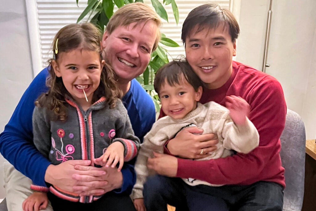 Brent Blackaby and Larry Huynh with children Clara and Dashiell.