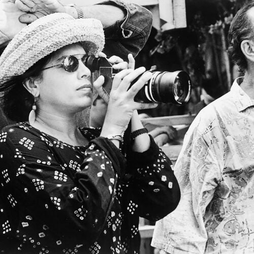 Mira Nair holds camera on set of "The Perez Family."
