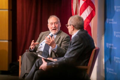 Nobel laureate economist Joseph Stiglitz, left, gives the 2022 Stone lecture on inequality with visiting HKS prof David Autor.