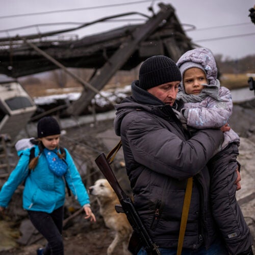 Fleeing family outside of Kyiv.