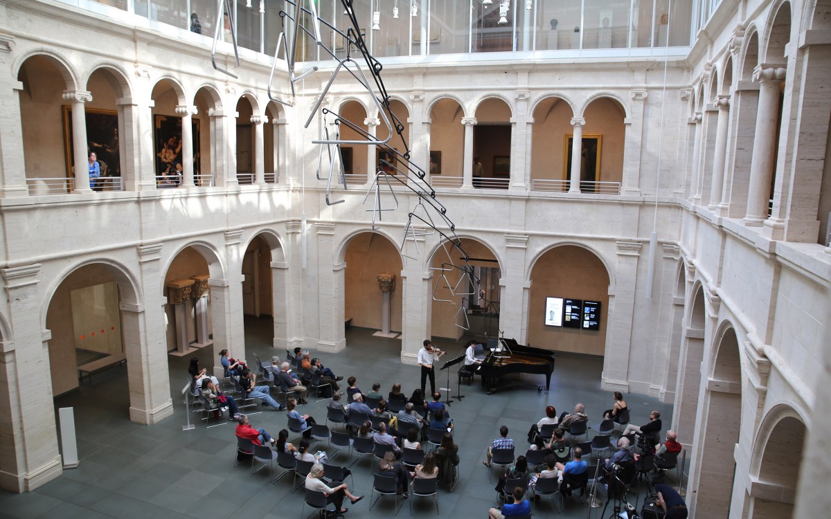 Student orchestra in Calderwood Courtyard, Harvard Art Museums.