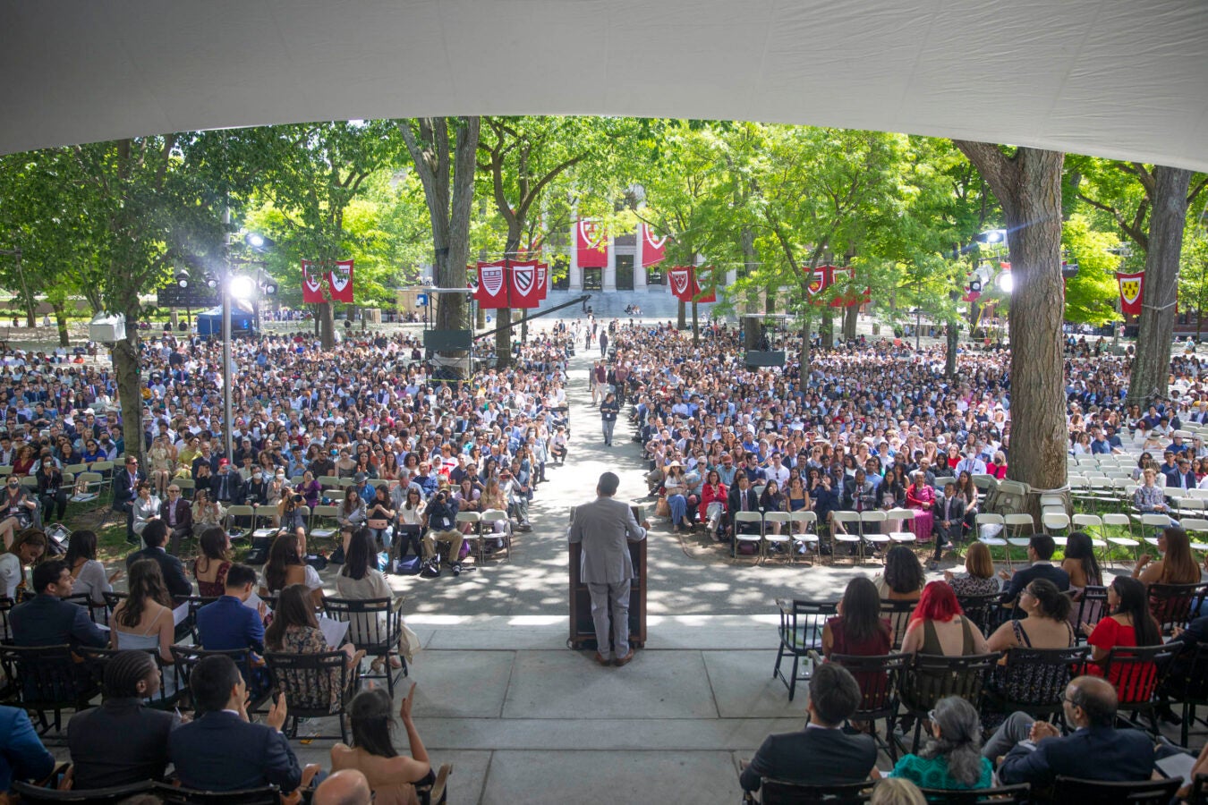 Rakesh Khurana, Dean of Harvard College, (from left) speaks to the Harvard Class of 2022