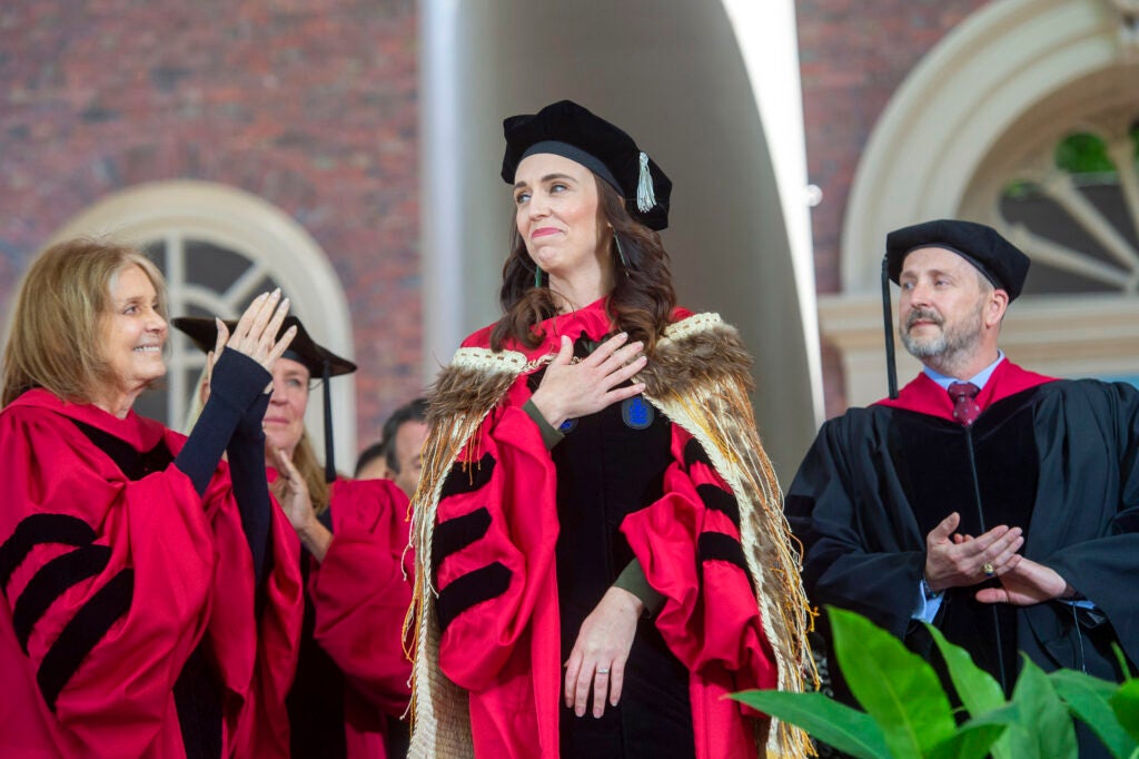 Jacinda Kate Laurell Ardern places her hand over her heart as they receive her honorary degrees.
