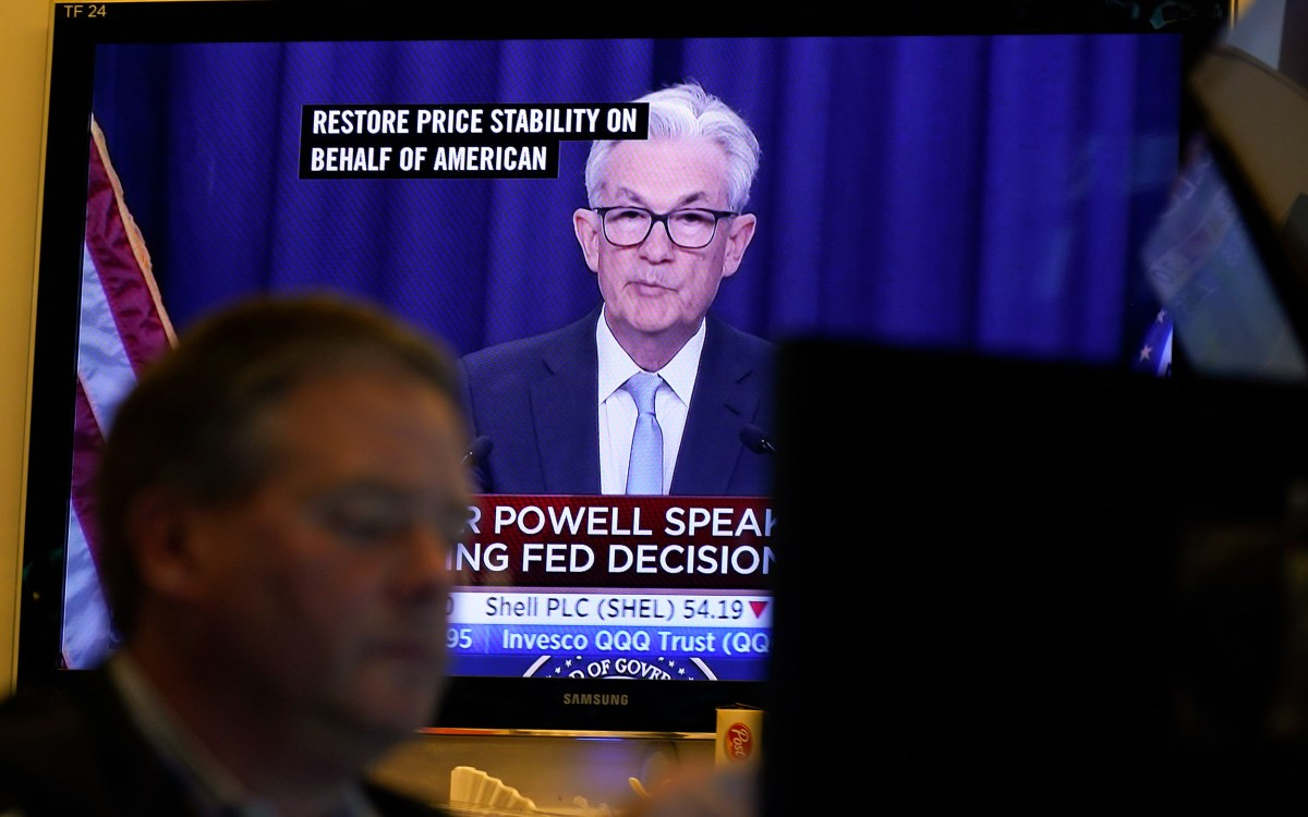 Jerome Powell seen on a TV at NY Stock Exchange.