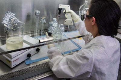 a Centers for Disease Control and Prevention (CDC) scientist, concentrating poliovirus from sewage.