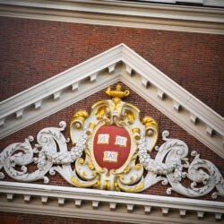 The Harvard Shield on a building