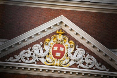 The Harvard Shield on a building