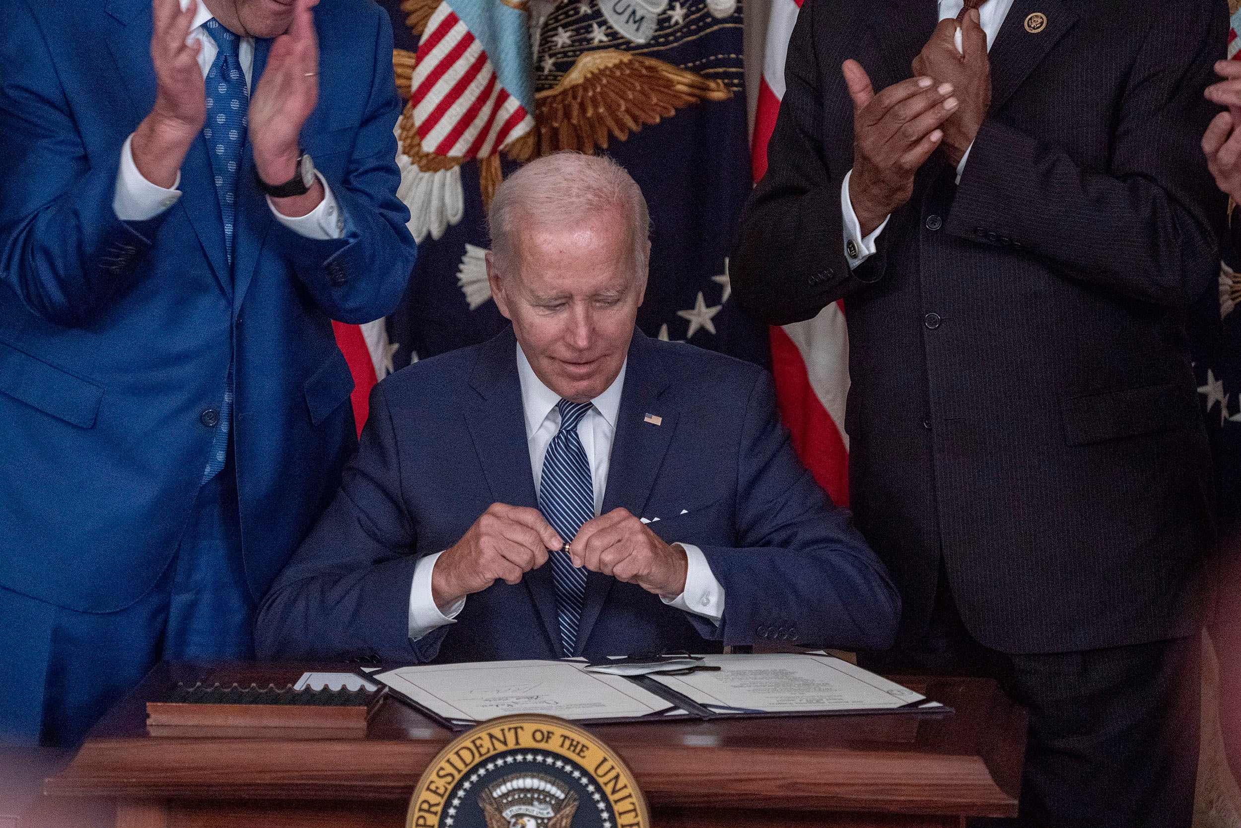 President Biden signs Inflation Reduction Act.