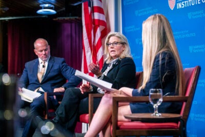 Liz Cheney talking with Matthew Mead and Hannah A. Bottarel.