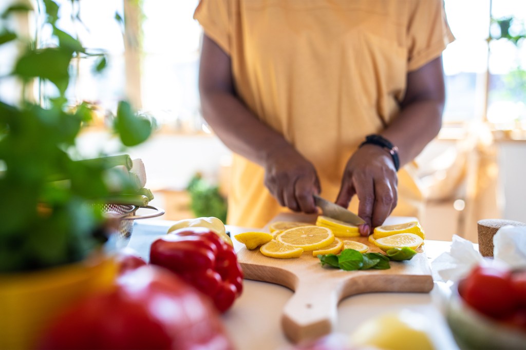 Woman cutting fruit