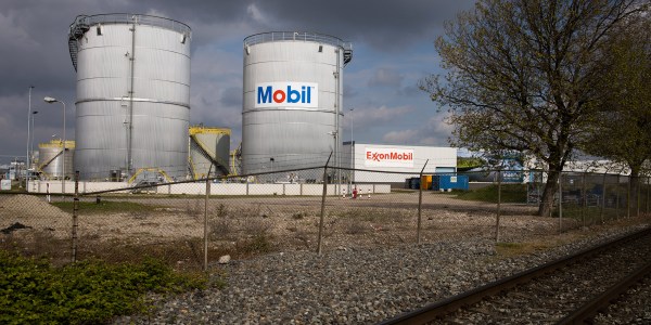 View of Exxon Mobil storage tanks of the petrochemical industry in the port of Rotterdam, Netherland